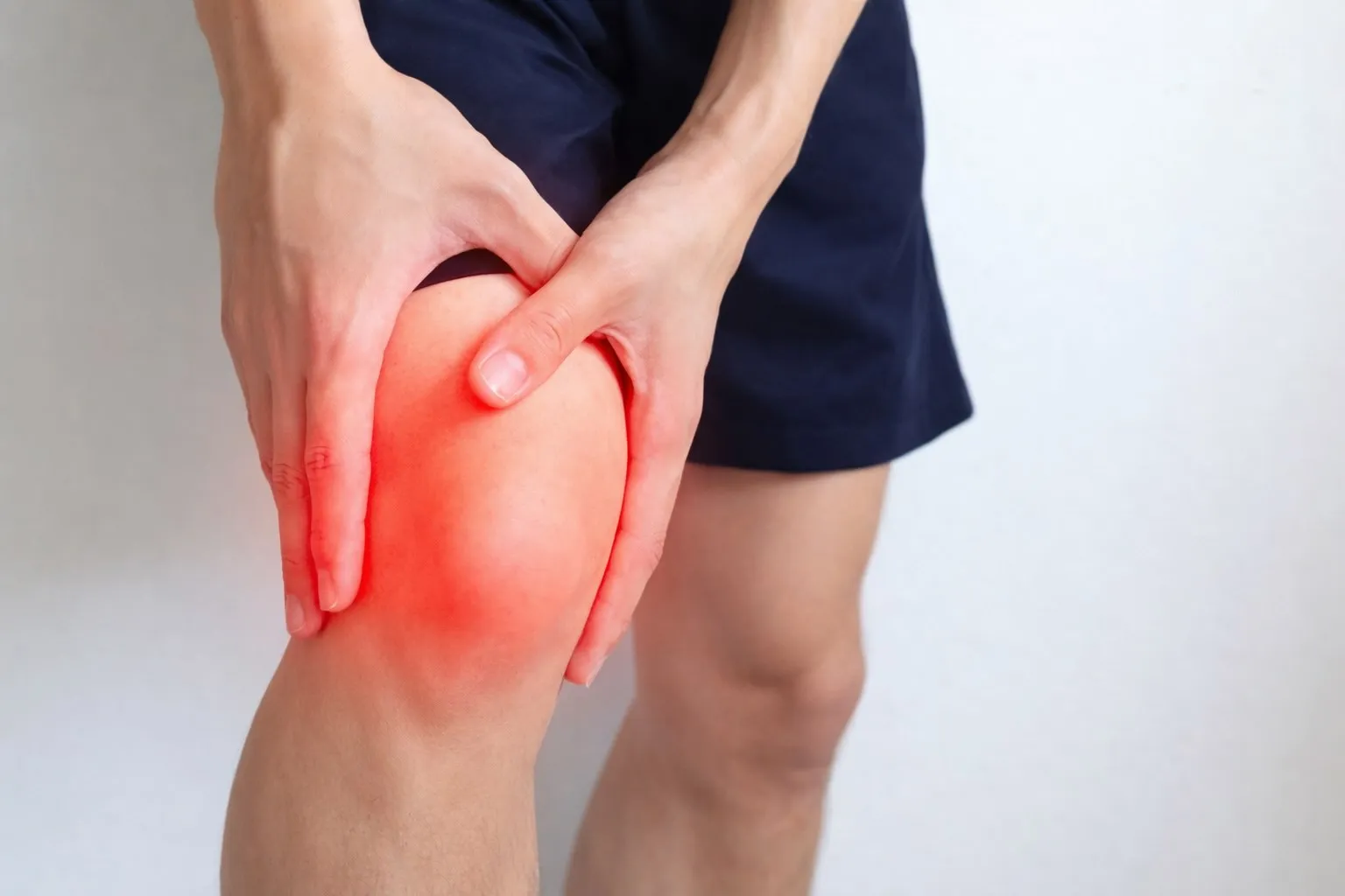 Douleur au genou externe chez un coureur souffrant du syndrome de l'essuie-glace